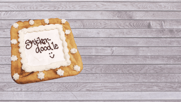Snickerdoodle cookie text on gray board